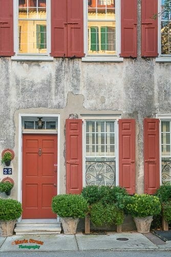Charleston Home with Red Window Shutters 17